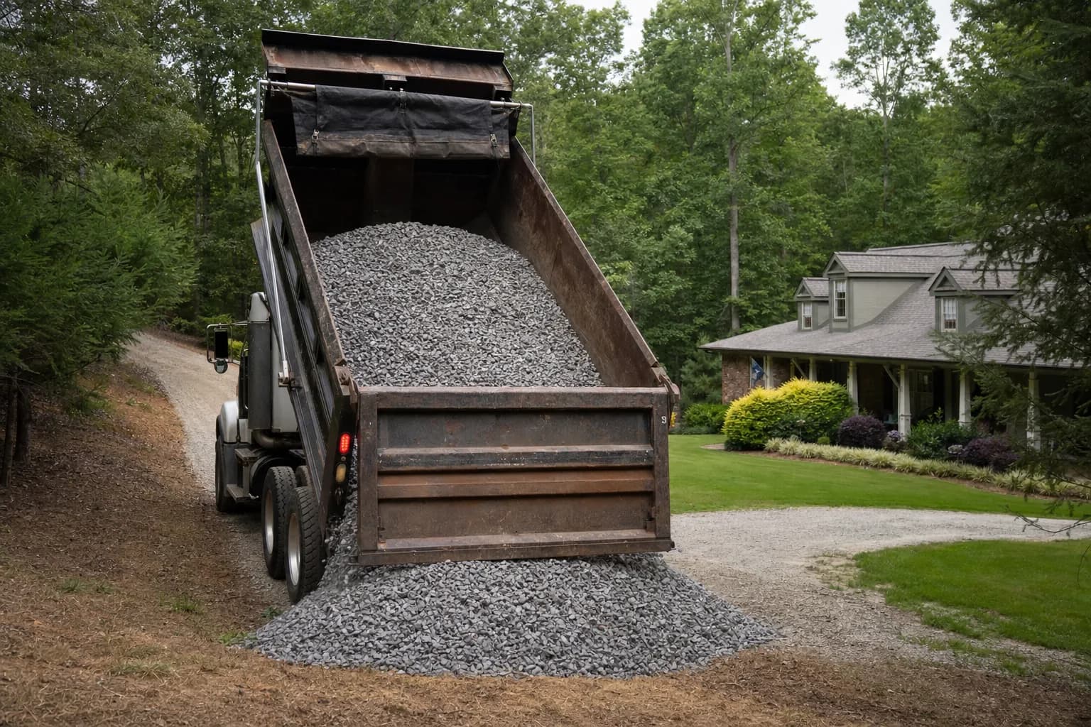 Freshly laid gravel driveway at a residential property